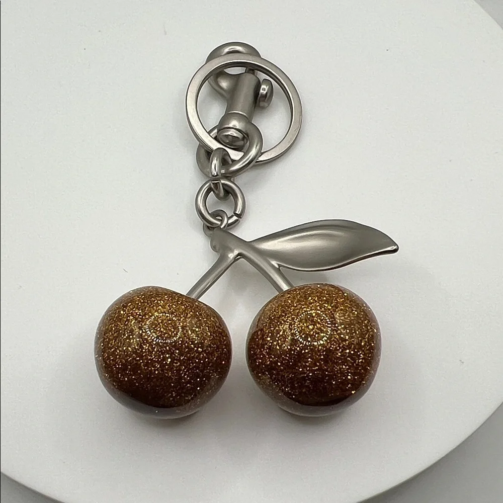 60. Gold Glittery‎ Cherry Keychain